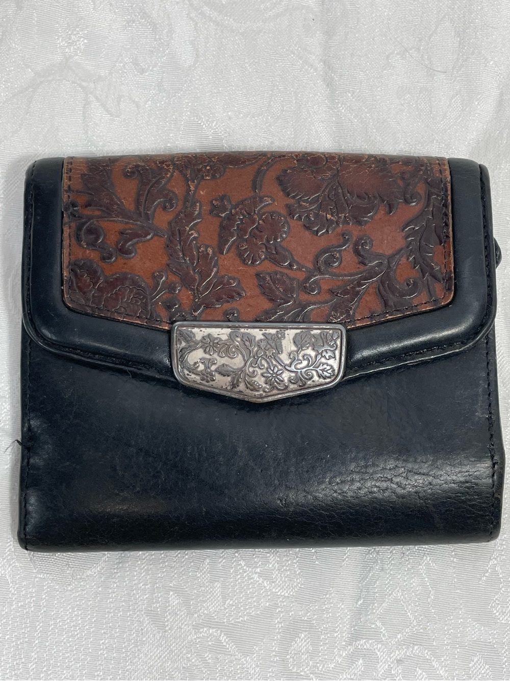 Brighton Vintage Tooled Leather Bifold Wallet in Black and Brown.
